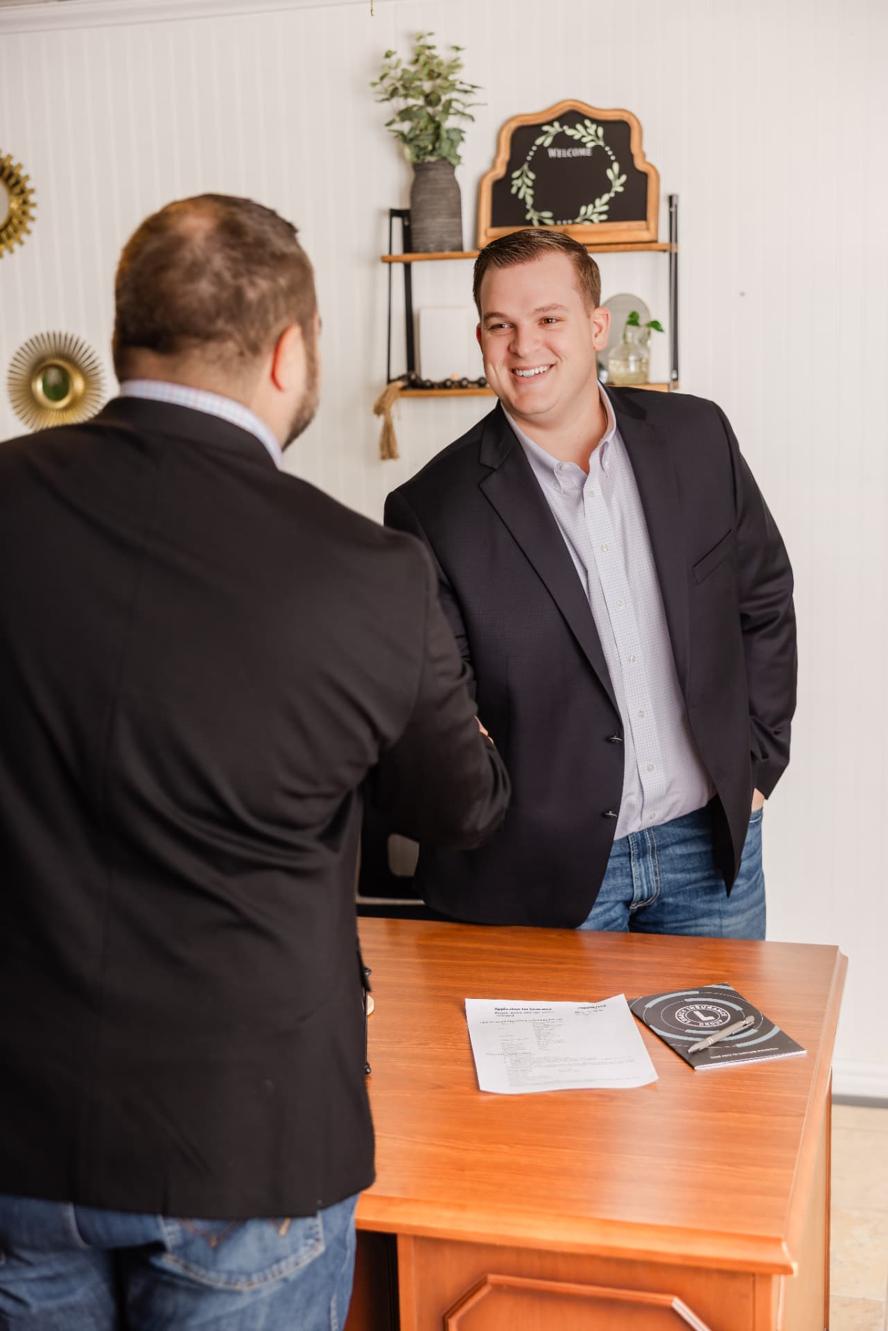 Kyson Kurszewski meeting with a client in the office